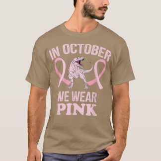 In oktober Draag we roze dinosauriërs met een bors T-shirt