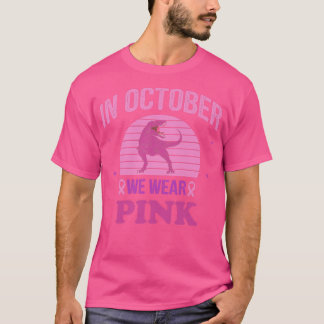 In oktober Draag we roze dinosauriërs met een bors T-shirt