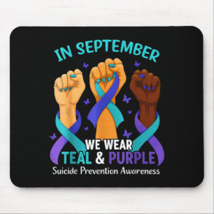 In september dragen we turquoise en paars ter prev muismat