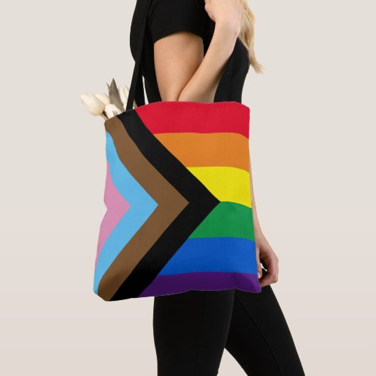Inclusief vlag voor homodiversiteit bij regenboogb tote bag (Dichtbij)