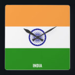 India Flag Dazzling Patriotic Square Vierkante Klok<br><div class="desc">India Flag Dazzling Patriotic Square Wall Clock in de kleuren en de elementen van de Indiase nationale vlag die de voorkant van de klok bedekt. De nationale vlagkleuren worden aangevuld met de tekst "India" onderaan. De tekst is volledig aanpasbaar gebruikend "pas het aan!" functie. Voel je vrij om het te...</div>