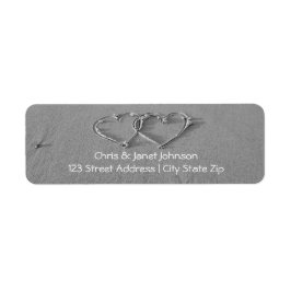 Ineengewikkelde harten in zand retouradreslabels etiket