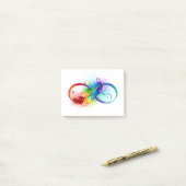 Infineensymbool met regenboogvanger post-it® notes (Op bureau)