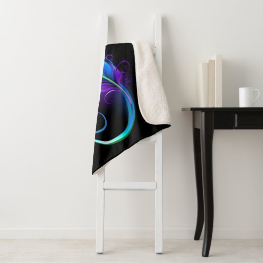 Infineensymbool met regenboogvanger sherpa deken (In situ)