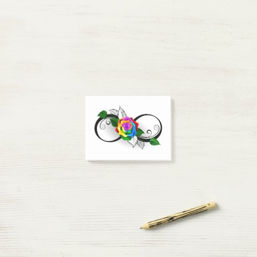 Infiniteitssymbool met regenboogRoos Post-it® Notes (Op bureau)
