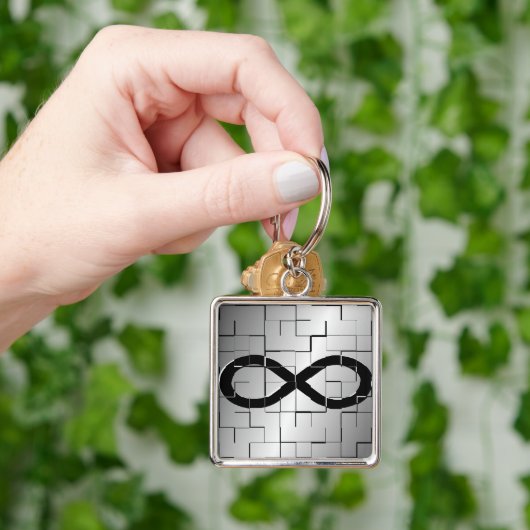 Infinity-symbool in het abstracte ontwerp van Maze Sleutelhanger (Hand)