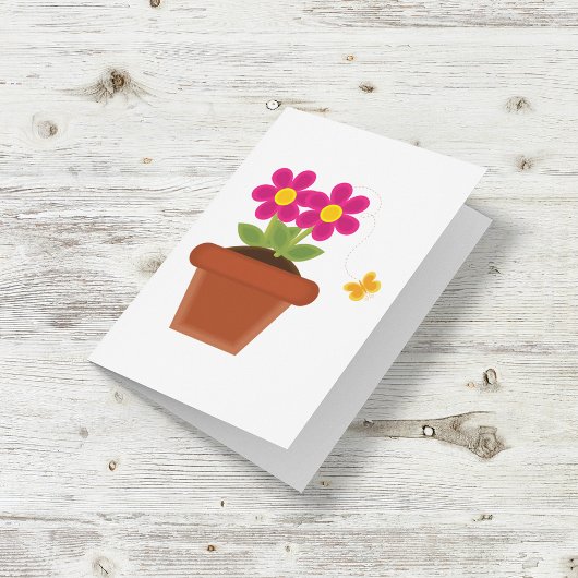 Ingebonden bloem en vlinder kaart