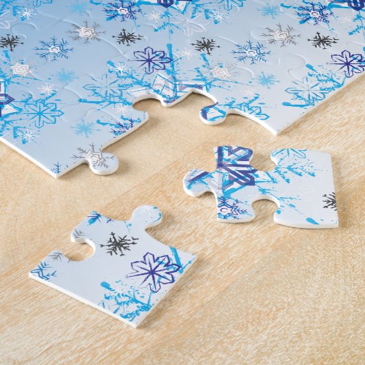 Ingewikkelde blauwe en witte sterren en sneeuwvlok legpuzzel (Zijkant)