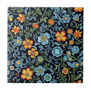 Ingewikkelde bloemkunst: blauwe en oranje bloemen tegeltje