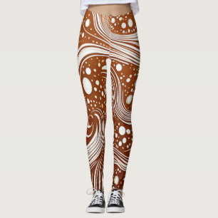 Ingewikkelde elegantie: wit ontwerp op bruine Legg Leggings