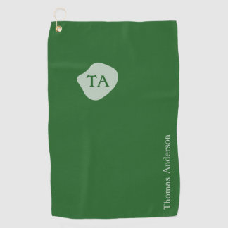Initiaal en naam in groen op donkergroen golfhanddoek