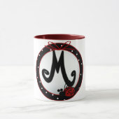 Initiaal Lady M Mok (Midden)