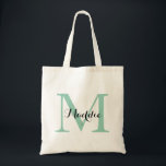 Initiaal Monogram Canvas tas, Mint Green en Black Tote Bag<br><div class="desc">Een geweldige canvas tas voor ongeveer iedereen! Deze tas heeft een groot initiaal en een enkele naam. Voeg je gegevens toe op het formulier sjabloon. Gebruik de functie Aanpassen om de lettertypekleur,  -stijl,  -grootte of -positie te wijzigen.</div>