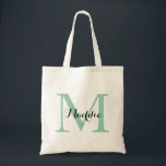Initiaal Monogram Canvas tas, Mint Green en Black Tote Bag<br><div class="desc">Een geweldige canvas tas voor ongeveer iedereen! Deze tas heeft een groot initiaal en een enkele naam. Voeg je gegevens toe op het formulier sjabloon. Gebruik de functie Aanpassen om de lettertypekleur, -stijl, -grootte of -positie te wijzigen.</div>