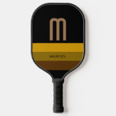Initiaal op een gestreept en modern pickleball paddle (Voorkant)