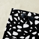 Initiaal van het witte tongpatroon Terrazzo Strandlaken (In situ)