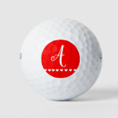 Initiaal van rode en witte monogram golfballen (Voorkant)