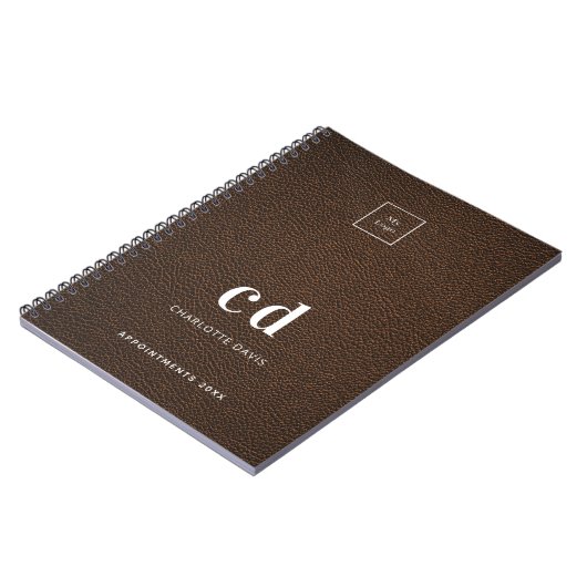 initialen van logo-bruinledermonogram notitieboek (Linkerzijde)