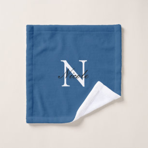 Initiële eigen handgeschreven naam in het blauw washandje
