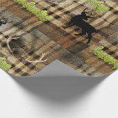 Inpakpapier met herten en herten gewei erop (Hoek)