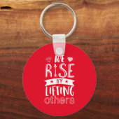 Inspirerend citaat dat wij verhogen door anderen o sleutelhanger (Voorkant)