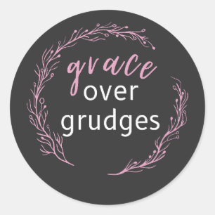Inspirerende quote over genade boven wrok ronde sticker