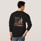 Instead of cursing the darkness, light a candle. t-shirt (Achterkant volledig)