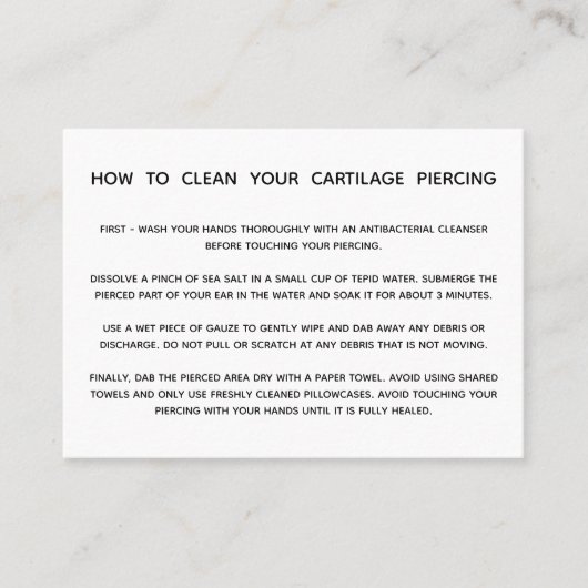 Instructies voor het doorboren van kraakbeen visitekaartje (Voorkant)