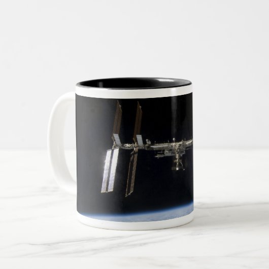 Internationaal ruimtestation 9 tweekleurige koffiemok (Voorkant links)