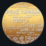 International Kerstmis: Navidad Greeting R Sticker<br><div class="desc">Wens Kerstmis in veel talen : Feliz Navidad - Feliz Natal - Joyeux Noel - Fröhliche Weihnachten - Vrolijk Kerstfeest - Buone Feste Natalizie - God jul - Merry Kerstmis, met dit prachtige typografische ontwerp zoals uitgesneden en papercut stijl (witte letters) op gouden achtergrond. Ontwerp op ronde sticker... U kunt...</div>