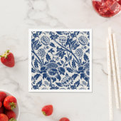 Intricate blue floral pattern on light background servet (Insitu)