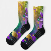 Iriserende mardi gras achtergrond met kralen sokken (Links)