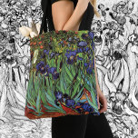 Irises van Vincent van Gogh,  tuinkunst Tote Bag<br><div class="desc">Prachtige canvas tassen die overdreven zijn! Beschikbaar in twee stijlen en twee grootten! Irises (1889) van Vincent van Gogh is een kunstschilderij van het impressionisme, een landschapsschilderij met een tuin met paarse, bebaarde irissen die door oranje papavers worden geteeld. Een enkele witte irisbloem bloeit aan de rand. Over de kunstenaar:...</div>