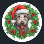 Irish Wolfhound Christmas Wreath Ronde Sticker<br><div class="desc">Voeg een feestelijk tintje toe aan uw vakantie correspondentie met onze feestelijke Ierse wolfshond Kerstkrans stickers! Deze charmante stickers zijn voorzien van een levendige afbeelding van een groene kerstkrans, met het schattige lachende gezicht van een Ierse wolfshond met een vrolijke rode kerstmuts in het midden. Ideaal voor hondenliefhebbers en vakantieliefhebbers,...</div>