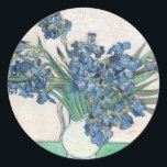 Irissen | Vincent van Gogh Ronde Sticker<br><div class="desc">Irissen (1890) | Origineel kunstwerk van de Nederlandse post-impressionist Vincent Van Gogh (1853-1890). Het schilderij beeldt een stilleven uit met een vol boeket blauwe bloemen op een groen tafelblad tegen een romige witte achtergrond. Gebruik de ontwerpgereedschappen om aangepaste tekst toe te voegen of het afbeelding te personaliseren.</div>