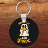 is een boekenblad spook in masker multiple scleros sleutelhanger (Voorkant)