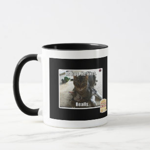 Is knuffel. Hij houdt van. Mok