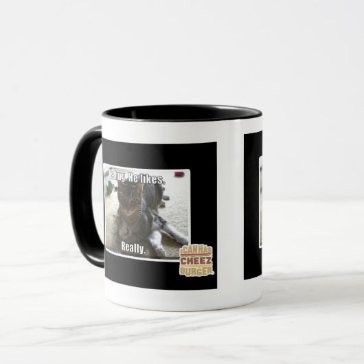 Is knuffel. Hij houdt van. Mok (Voorkant links)