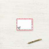 Italiaanse cartoon met windnoop Paw drukt koraal a Post-it® Notes (Op bureau)