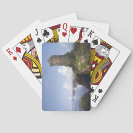 Italiaanse kustscène met een verbrande toren pokerkaarten