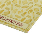 Italiaanse pasta vormt keuken met voedselpatroon snijplank (Hoek)