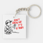 It's a trap sleutelhanger (Achterkant)