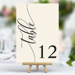 Ivoor Crème Moderne Kalligrafie Bruiloft Kaart<br><div class="desc">Leid uw gasten naar hun stoelen met deze chique elegante ivoren crème trouwtafelnummers. Met een minimalistisch ontwerp met moderne kalligrafie, voegen deze tafelnummers een vleugje verfijning toe aan uw huwelijksreceptie. De zachte achtergrond en de schone, elegante typografie zorgen voor eenvoudige leesbaarheid en verbeteren tegelijkertijd uw bruiloft decor. Perfect voor elk...</div>