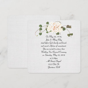 ivoorwijn en bloembouquet op textuurlinnen kaart