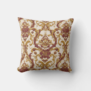 Ivoren barok ornament met goud en bordeauxrood kussen