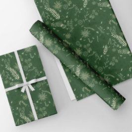 Ivoren bloemendoedels op groen inpakpapier vel