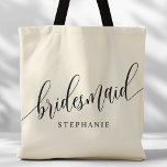 Ivory Cream Bruidsmeisje Modern Script Tote Bag<br><div class="desc">Show uw waardering voor uw bruidsfeest met deze stijlvolle ivoren crème bruidsmeisje canvas tas. Met modern script en aanpasbaar met de naam van uw bruidsmeisje, deze canvas tas is zowel praktisch als elegant. De zachte kleur en het chique ontwerp maken het perfect voor het dragen van bruiloft dag benodigdheden of...</div>