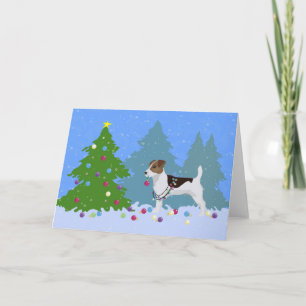 Jack Russell Terrier die kerstboom decorteert Feestdagen Kaart