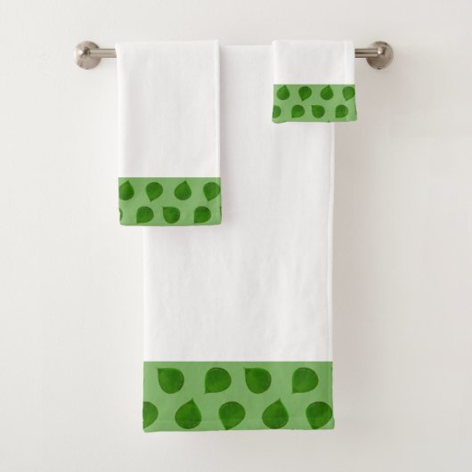 Jadeboombladeren op groen en wit bad handdoek (Insitu)