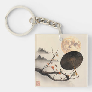 Japandi geïnspireerde takken zachte pastels sleutelhanger
